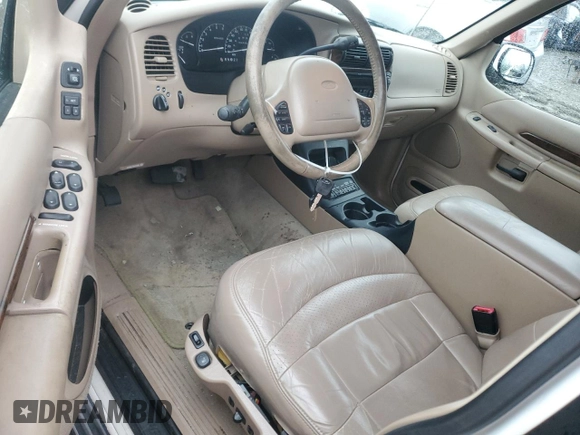 1999 Ford Explorer XLT z VIN 1FMDU35P0XZB93331, wystawiony jako Copart lot #89057375 z przebiegiem 94 699 mil mil oraz Szkoda całkowita • Salvage title. Historia ofert i sprzedaży dostępna na DreamBid. Obrazek 8.