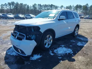2015 Dodge Durango Limited with VIN 1C4RDJDG3FC771956, listed as a IAAI auction lot 41630105 with 103,657 mi miles and . Bid and sale history available at DreamBid. Image 2.