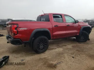 2023 Chevrolet Colorado 4WD Trail Boss z VIN 1GCPTEEK7P1252328, wystawiony jako Copart lot #53208005 z przebiegiem Nie podano mil oraz Szkoda całkowita • Salvage title. Historia ofert i sprzedaży dostępna na DreamBid. Obrazek 3.