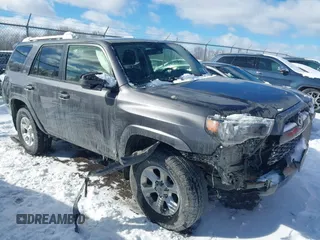 2018 Toyota 4Runner SR5 with VIN JTEBU5JR6J5536801, listed as a IAAI auction lot 41674894 with 136,859 mi miles. Bid and sale history available at carsss.com. Image 1.