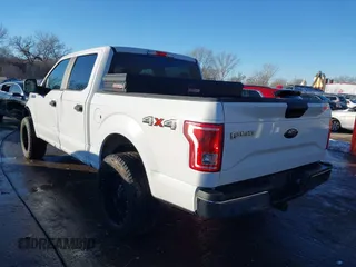2016 Ford F-150 XLT with VIN 1FTEW1EF7GKE07318, listed as a IAAI auction lot 41316812 with 106,579 mi miles. Bid and sale history available at carsss.com. Image 3.