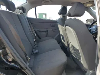 2010 Kia Rio LX with VIN KNADH4A3XA6652808, listed as a Copart auction lot 42597245 with 164,768 mi miles and Salvage Title. Bid and sale history available at carsss.com. Image 10.