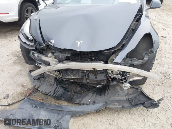 2022 Tesla Model 3 Long Range z VIN 5YJ3E1EB8NF315359, wystawiony jako IAAI lot #42035599 z przebiegiem 54 974 mil mil oraz . Historia ofert i sprzedaży dostępna na DreamBid. Obrazek 6.
