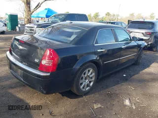 2009 Chrysler 300 Limited with VIN 2C3KA33V59H570460, listed as a IAAI auction lot 42017573 with 130,600 mi miles. Bid and sale history available at carsss.com. Image 4.