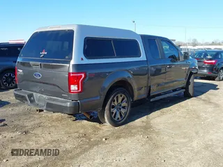 2015 Ford F-150 XL with VIN 1FTEX1C85FKD46390, listed as a IAAI auction lot 41367960 with 209,889 mi miles. Bid and sale history available at carsss.com. Image 4.