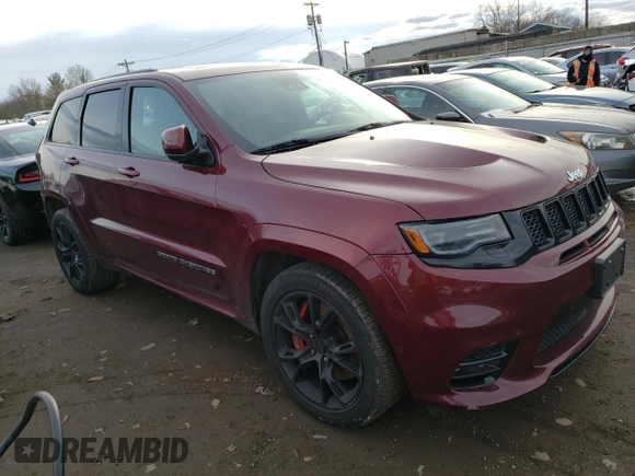 2017 Jeep Grand Cherokee SRT with VIN 1C4RJFDJ3HC919625, listed as a Copart auction lot 56986453 with 52,711 mi miles and Salvage Title. Bid and sale history available at carsss.com. Image 4.
