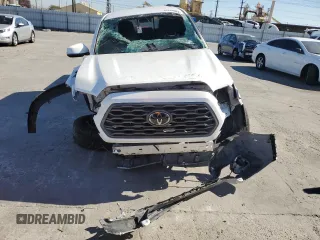 2020 Toyota Tacoma SR5 with VIN 3TMAZ5CN8LM115056, listed as a Copart auction lot 46948805 with 87,713 mi miles and Salvage title. Bid and sale history available at DreamBid. Image 5.