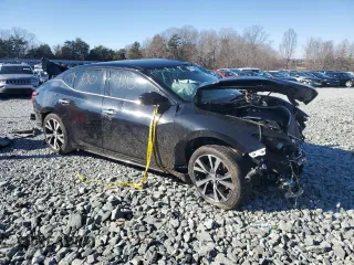 2018 Nissan Maxima S with VIN 1N4AA6AP8JC370084, listed as a Copart auction lot 87750495 with Not Provided miles and Salvage Title. Bid and sale history available at DreamBid. Image 4.