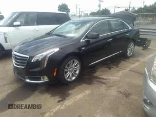 2019 Cadillac XTS Luxury with VIN 2G61M5S30K9131129, listed as a IAAI auction lot 33247508 with 89,208 mi miles and . Bid and sale history available at DreamBid. Image 2.