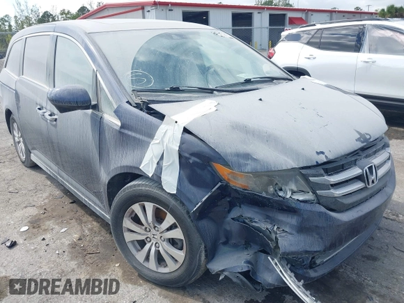 2015 Honda Odyssey EX-L z VIN 5FNRL5H65FB090177, wystawiony jako IAAI lot #41575419 z przebiegiem 128 582 mil mil oraz . Historia ofert i sprzedaży dostępna na DreamBid. Obrazek 6.