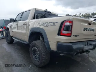 2022 Ram 1500 TRX with VIN 1C6SRFU92NN383774, listed as a IAAI auction lot 41788415 with 34,646 mi miles and . Bid and sale history available at DreamBid. Image 3.