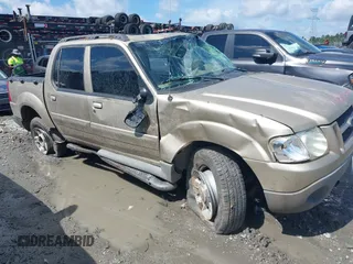 2003 Ford Explorer Sport Trac XLS with VIN 1FMZU77E23UC35868, listed as a IAAI auction lot 42530211 with 223,483 mi miles and . Bid and sale history available at DreamBid. Image 1.