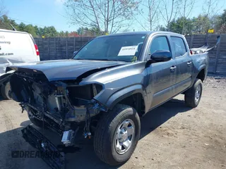 2023 Toyota Tacoma SR with VIN 3TMCZ5AN0PM614127, listed as a IAAI auction lot 41974924 with 12,674 mi miles and . Bid and sale history available at DreamBid. Image 2.