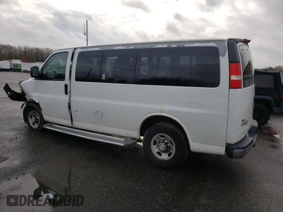 2012 Chevrolet Express Passenger 1LT with VIN 1GAZGYFG3C1118315, listed as a Copart auction lot 80870104 with 122,178 mi miles and Salvage title. Bid and sale history available at DreamBid. Image 2.