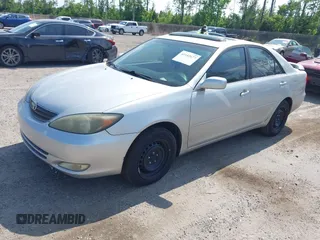 2003 Toyota Camry LE with VIN 4T1BE32K63U752904, listed as a IAAI auction lot 42142677 with 112,895 mi miles and . Bid and sale history available at DreamBid. Image 2.