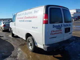 2005 Chevrolet Express Cargo Van with VIN 1GCGG25V151109899, listed as a IAAI auction lot 41287595 with 1 mi miles. Bid and sale history available at carsss.com. Image 3.