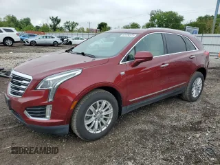 2017 Cadillac XT5 FWD with VIN 1GYKNARS6HZ245505, listed as a Copart auction lot 57726375 with 125,701 mi miles and Salvage title. Bid and sale history available at DreamBid. Image 1.