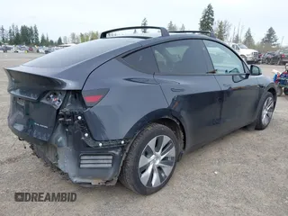 2024 Tesla Model Y Long Range with VIN 7SAYGAEE5RF981789, listed as a IAAI auction lot 41991292 with 21,103 mi miles. Bid and sale history available at carsss.com. Image 4.