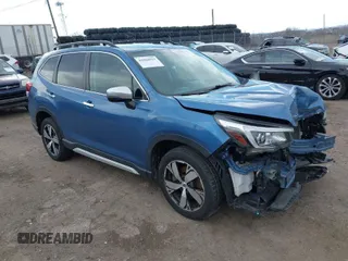 2019 Subaru Forester Touring with VIN JF2SKAWC7KH489948, listed as a IAAI auction lot 41820223 with 72,554 mi miles. Bid and sale history available at carsss.com. Image 1.