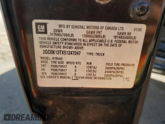 2005 Chevrolet Silverado 1500 LT with VIN 2GCEK13TX51247047, listed as a Copart auction lot 52769025 with 201,593 mi miles and Salvage Title. Bid and sale history available at DreamBid. Image 12.