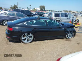 2018 Audi A5 Sportback Premium z VIN WAUANCF53JA003557, wystawiony jako IAAI lot #42079150 z przebiegiem 78 259 mil mil oraz . Historia ofert i sprzedaży dostępna na DreamBid. Obrazek 13.