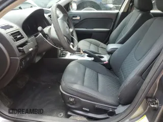 2010 Ford Fusion SE with VIN 3FAHP0HA4AR387638, listed as a Copart auction lot 60649585 with 210,779 mi miles and Salvage title. Bid and sale history available at DreamBid. Image 7.