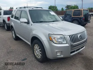 2009 Mercury Mariner Premier z VIN 4M2CU87G59KJ03719, wystawiony jako IAAI lot #42606217 z przebiegiem 123 065 mil mil oraz . Historia ofert i sprzedaży dostępna na DreamBid. Obrazek 1.
