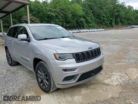 2018 Jeep Grand Cherokee High Altitude with VIN 1C4RJFCT8JC344110, listed as a Copart auction lot 60257065 with 94,917 mi miles and Salvage title. Bid and sale history available at DreamBid. Image 13.