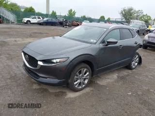 2023 Mazda CX-30 S Preferred z VIN 3MVDMBCM5PM576771, wystawiony jako IAAI lot #42244842 z przebiegiem 14 814 mil mil oraz . Historia ofert i sprzedaży dostępna na DreamBid. Obrazek 20.