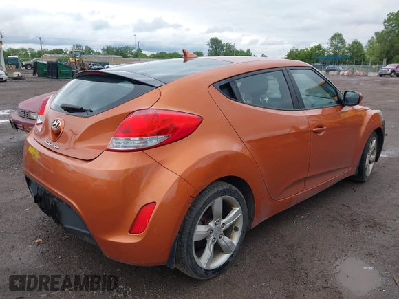 2012 Hyundai Veloster w/Gray Int with VIN KMHTC6AD3CU057620, listed as a IAAI auction lot 42320549 with 113,491 mi miles and . Bid and sale history available at DreamBid. Image 4.