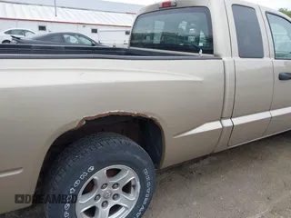 2005 Dodge Dakota SLT with VIN 1D7HE42K75S176815, listed as a IAAI auction lot 42160096 with 121,671 mi miles and . Bid and sale history available at carsss.com. Image 15.