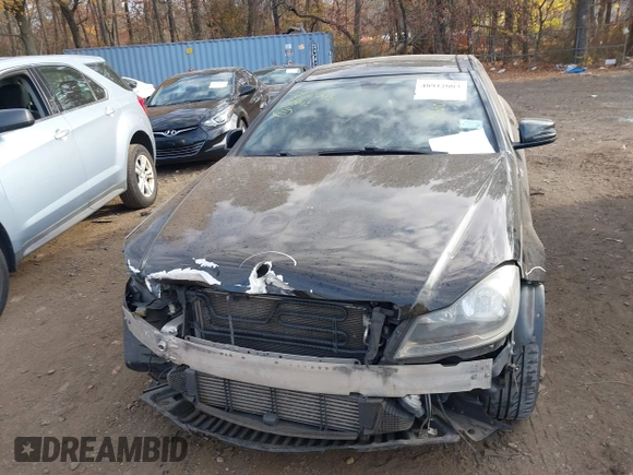 2015 Mercedes-Benz C-Class C 250 with VIN WDDGJ4HB4FG367188, listed as a IAAI auction lot 40912003 with 121,128 mi miles. Bid and sale history available at carsss.com. Image 12.