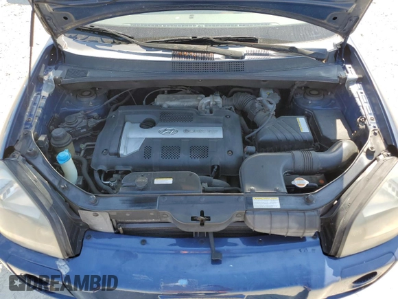 2005 Hyundai Tucson GL with VIN KM8JM12B75U163964, listed as a Copart auction lot 53674845 with 111,665 mi miles and Clean Title. Bid and sale history available at carsss.com. Image 12.