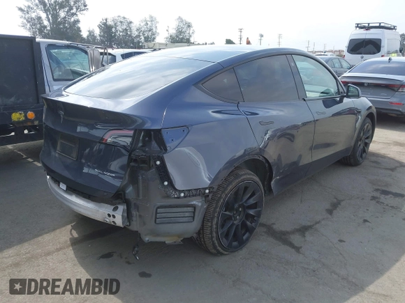 2022 Tesla Model Y Long Range z VIN 7SAYGDEE6NF364994, wystawiony jako IAAI lot #42322587 z przebiegiem 41 572 mil mil oraz . Historia ofert i sprzedaży dostępna na DreamBid. Obrazek 4.