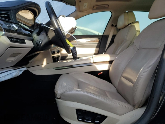 2012 BMW 7 Series 750Li with VIN WBAKB8C52CDW84794, listed as a Copart auction lot 49874315 with 118,725 mi miles and Salvage Title. Bid and sale history available at carsss.com. Image 7.