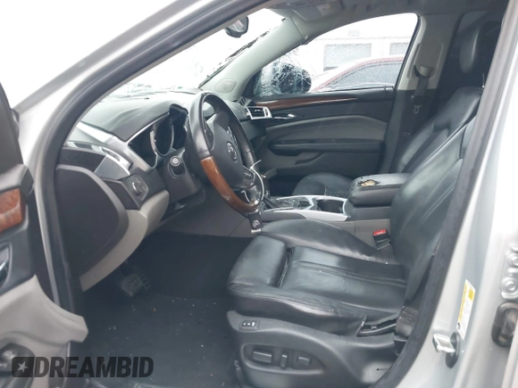 2011 Cadillac SRX Luxury Collection with VIN 3GYFNAEY5BS678474, listed as a IAAI auction lot 41885759 with 176,341 mi miles. Bid and sale history available at carsss.com. Image 5.