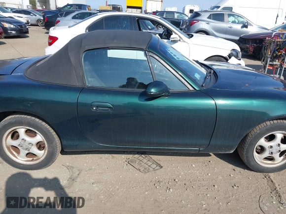 1999 Mazda MX-5 Miata with VIN JM1NB3537X0109618, listed as a IAAI auction lot 41795736 with 160,452 mi miles and . Bid and sale history available at DreamBid. Image 14.