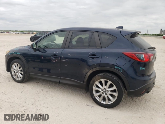 2015 Mazda CX-5 Grand Touring with VIN JM3KE4DY1F0480406, listed as a Copart auction lot 52349945 with 166,515 mi miles and Salvage Title. Bid and sale history available at carsss.com. Image 2.