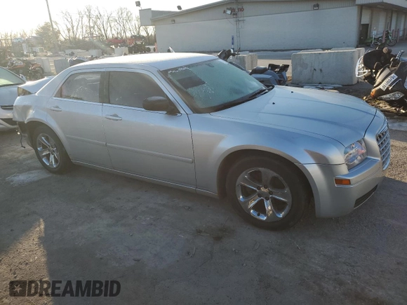 2005 Chrysler 300 with VIN 2C3JA43R65H528703, listed as a Copart auction lot 42057285 with 159,316 mi miles and Salvage Title. Bid and sale history available at carsss.com. Image 4.