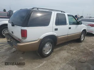 2000 GMC Jimmy SL with VIN 1GKCS13W4Y2106047, listed as a Copart auction lot 75257184 with 73,571 mi miles and Non Repairable. Bid and sale history available at carsss.com. Image 3.