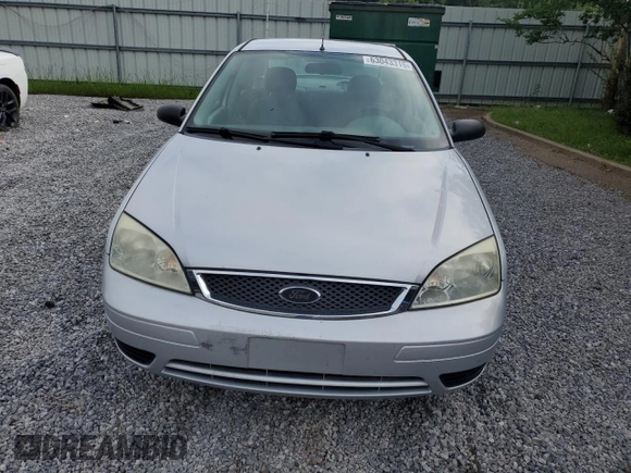 2005 Ford Focus S with VIN 1FAFP34N55W115653, listed as a Copart auction lot 63043315 with 110,593 mi miles and Salvage title. Bid and sale history available at DreamBid. Image 5.
