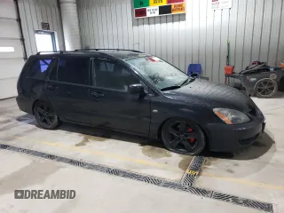 2004 Mitsubishi Lancer z VIN JA3AD29F44U024617, wystawiony jako Copart lot #51847765 z przebiegiem 172 585 mil mil oraz Szkoda całkowita • Salvage title. Historia ofert i sprzedaży dostępna na DreamBid. Obrazek 4.