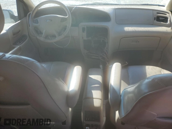 2002 Ford Windstar SEL with VIN 2FMDA53432BB05185, listed as a Copart auction lot 80389234 with 166,397 mi miles and Salvage title. Bid and sale history available at DreamBid. Image 8.