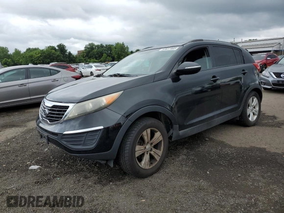 2011 Kia Sportage LX with VIN KNDPBCA24B7012852, listed as a Copart auction lot 63837085 with 186,805 mi miles and Salvage title. Bid and sale history available at DreamBid. Image 1.