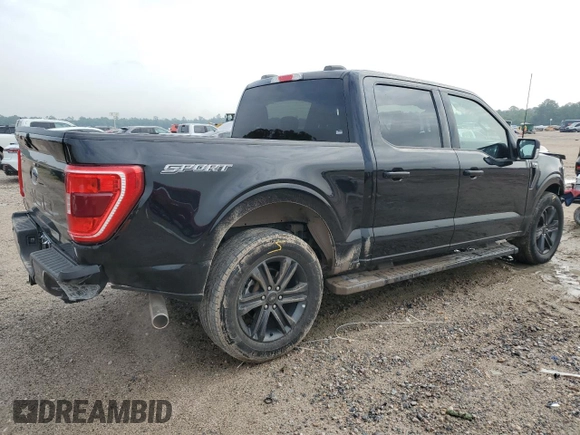 2023 Ford F-150 XL with VIN 1FTEW1C59PFC27499, listed as a Copart auction lot 54453255 with 58,554 mi miles and Salvage title. Bid and sale history available at DreamBid. Image 3.