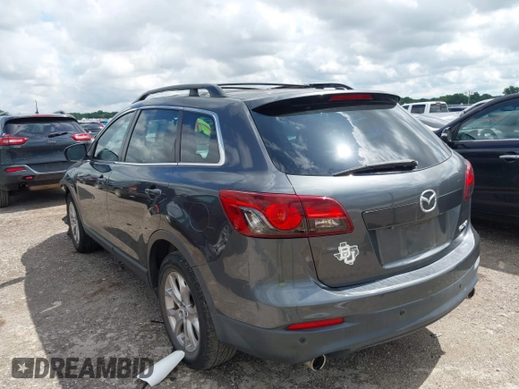 2015 Mazda CX-9 Touring with VIN JM3TB2CA7F0460232, listed as a IAAI auction lot 42344122 with 103,478 mi miles and . Bid and sale history available at DreamBid. Image 3.