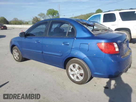 2010 Kia Rio LX with VIN KNADH4A35A6635429, listed as a Copart auction lot 53266835 with 110,615 mi miles and Salvage Title. Bid and sale history available at carsss.com. Image 2.