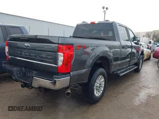 2020 Ford F-250 XL with VIN 1FT7W2BNXLEC88523, listed as a IAAI auction lot 41413956 with 64,787 mi miles and . Bid and sale history available at DreamBid. Image 4.