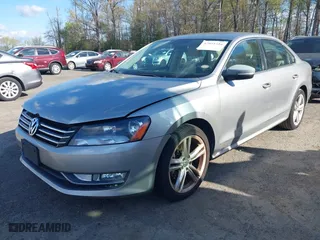 2013 Volkswagen Passat TDI SE with VIN 1VWBN7A34DC103273, listed as a IAAI auction lot 42051516 with 105,607 mi miles. Bid and sale history available at carsss.com. Image 2.