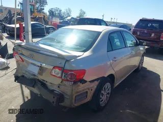 2013 Toyota Corolla L with VIN 5YFBU4EE2DP212354, listed as a IAAI auction lot 42023008 with 193,833 mi miles and . Bid and sale history available at DreamBid. Image 4.